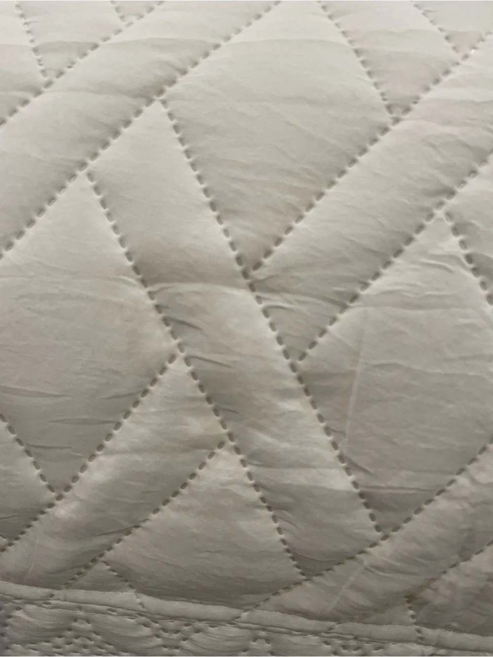 White king size quilted bedspread with shams